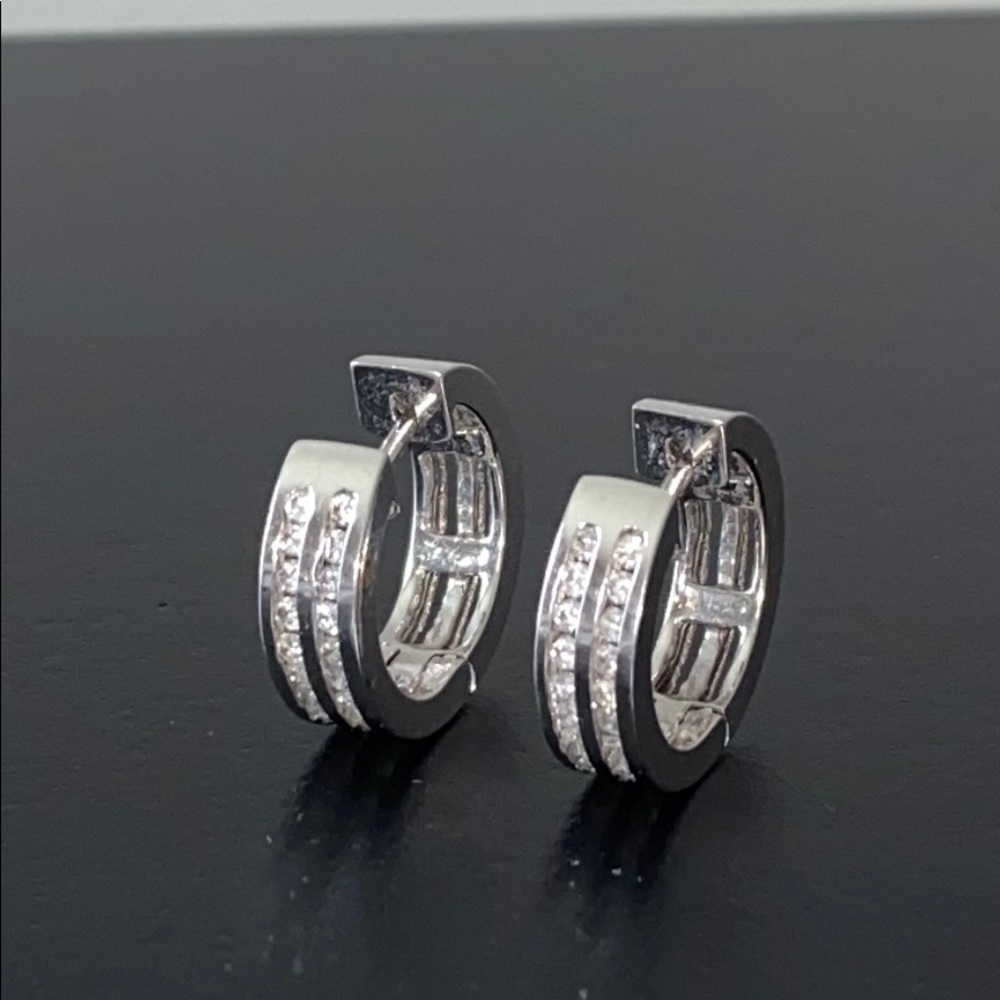 14Kt Solid White Gold channel set zirc. earrings